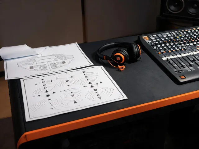 Professional audio support desk with venue system plans