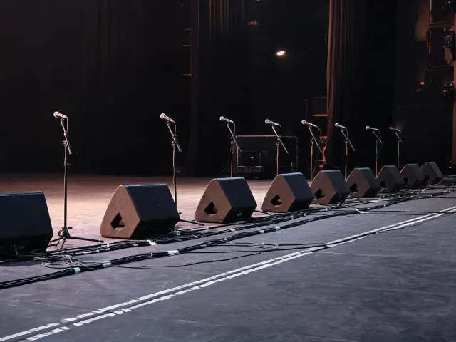 Stage monitor line across a performance deck